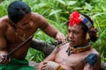 Men Mentawai tribe make tattoo.